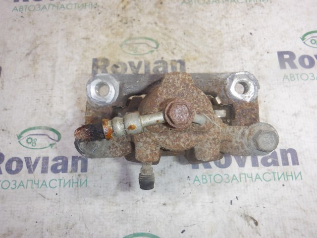 Задній гальмівний супорт лівий 440114EA0A NISSAN