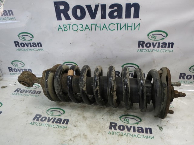 Амортизатор передній 561005X07B NISSAN