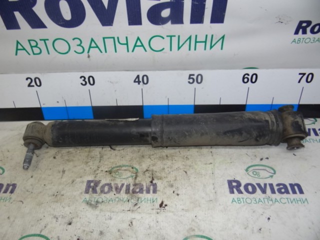 Стійка амортизатора задня 562108595R RENAULT