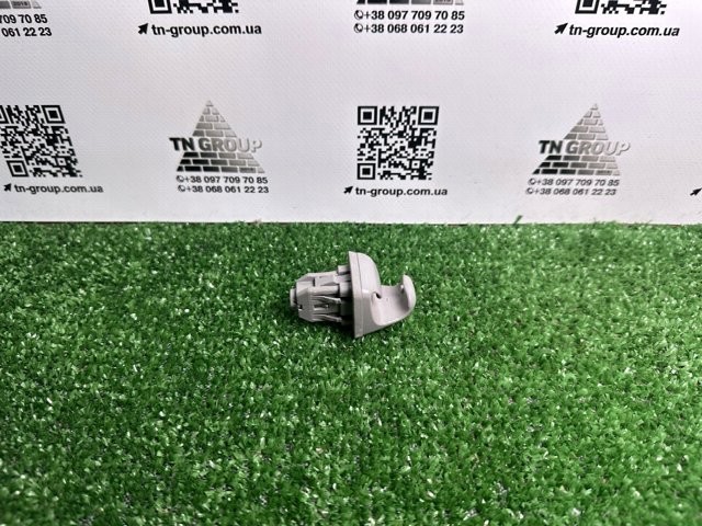 Фіксатор сонцезахисного козирка 7434833040B0 TOYOTA