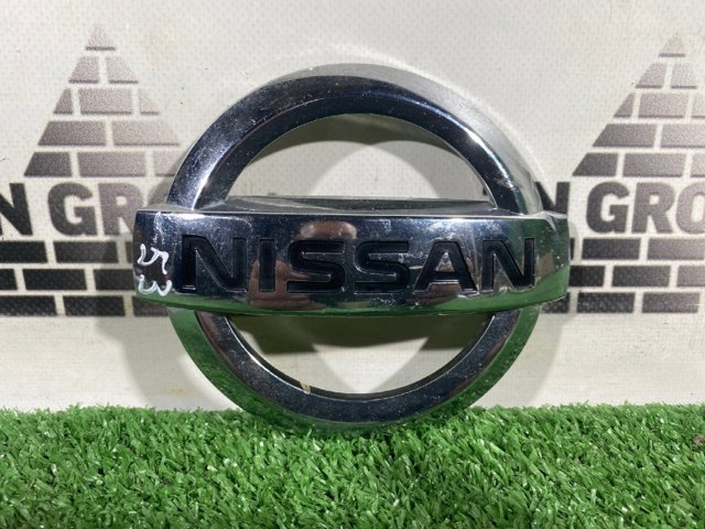 Фірмовий значок на кришку багажника 848904CL0A NISSAN