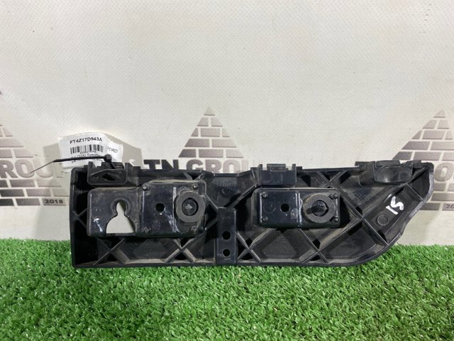 Кронштейн бампера заднього, лівий FT4Z17D943A FORD
