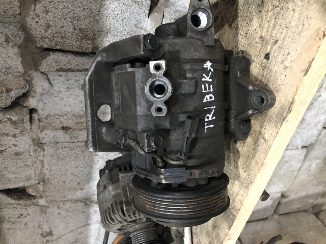 Компресор кліматичної установки 73111AG011 SUBARU
