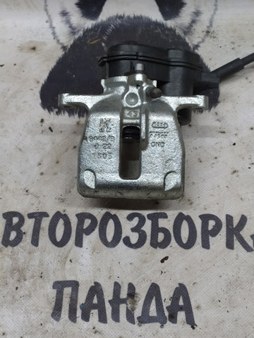 Задній гальмівний супорт лівий 8K0615403B VAG