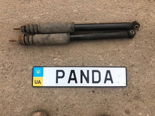 Стійка амортизатора задня E62109MB0A NISSAN