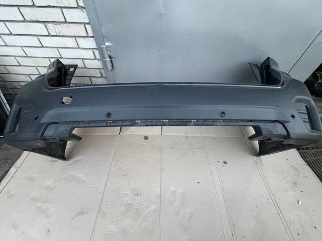 Кожух бампера заднього 57704AN31A SUBARU