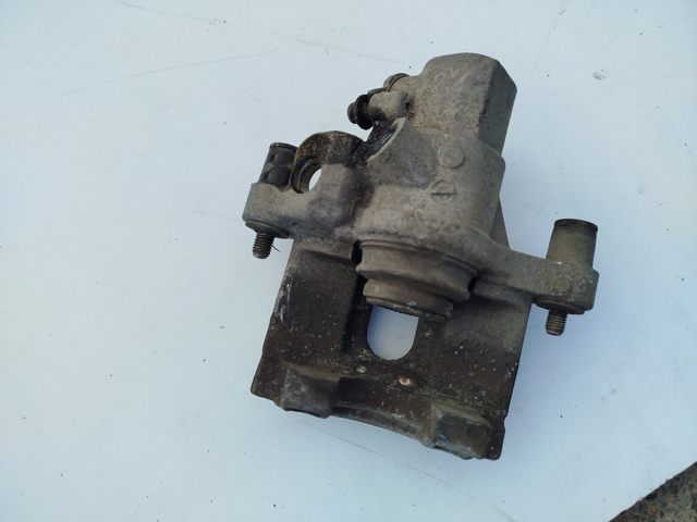 Супорт гальмівний задній правий 8M5Z2552B FORD