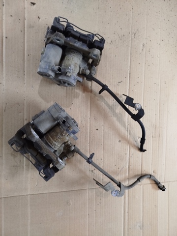 Супорт гальмівний задній правий DG9Z2552C FORD