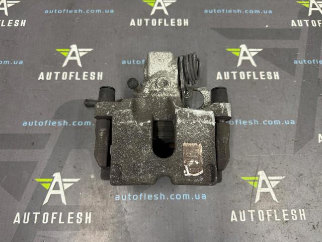 Задній гальмівний супорт лівий 1610900680 PEUGEOT
