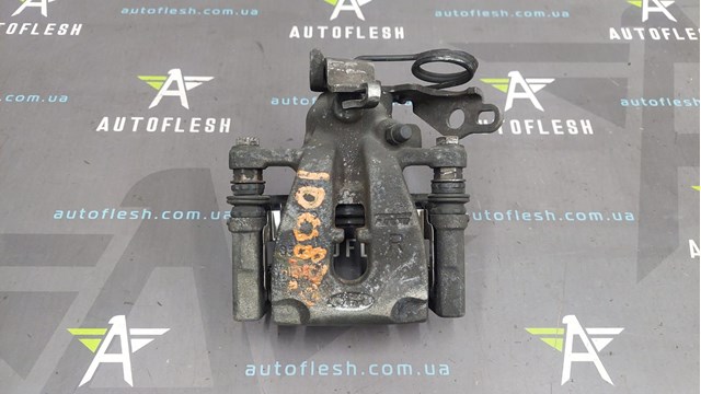 Супорт гальмівний задній правий 1738987 FORD
