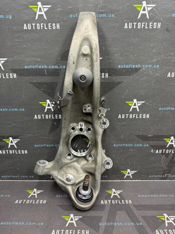Цапфа передні праві 31206884386 BMW