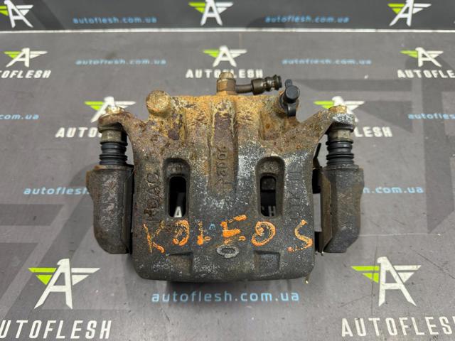 Супорт гальмівний, передній, лівий 41011CC00A NISSAN
