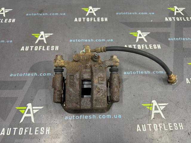 Супорт гальмівний задній правий 44001JY00A RENAULT