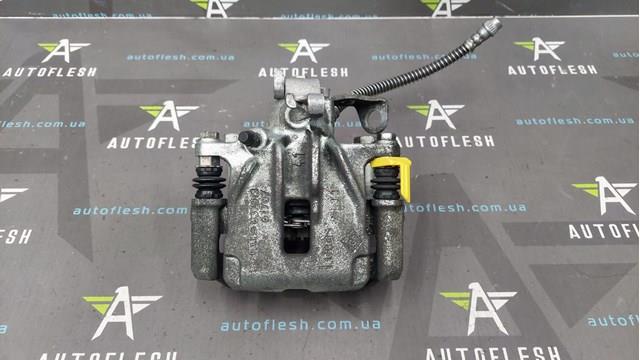 Задній гальмівний супорт лівий 7701056166 RENAULT
