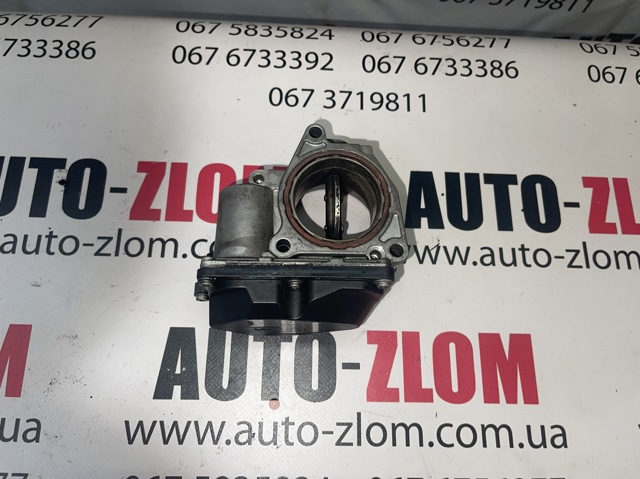 Дросільна заслінка в зборі 03G128063M VAG