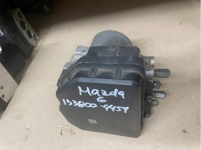 Блок управління АБС (ABS) 1338004451 MAZDA