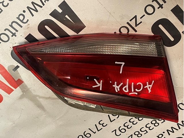 Задня ліва внутрішня фара 39077378 OPEL