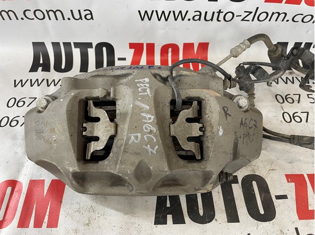 Супорт гальмівний, передній, правий 4M0615106FS VAG