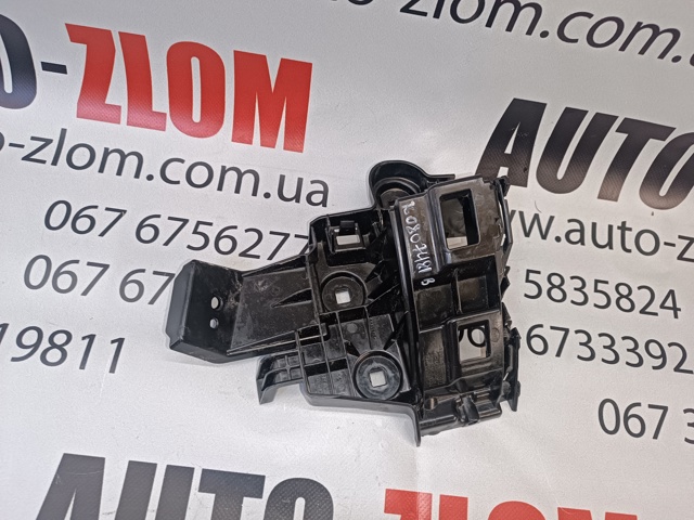 Кронштейн бампера заднього, правий 760807484B VAG