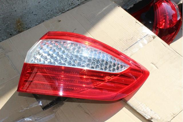 Фара задня права зовнішня 7S7113404B FORD