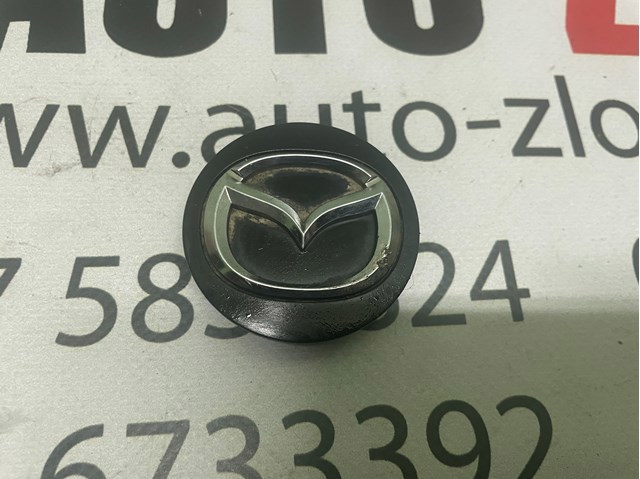 Заглушка маточини BBM237190 MAZDA