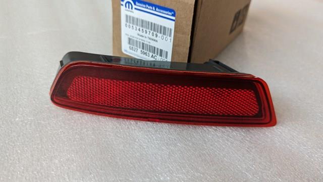 Катафот (відбивач) заднього бампера, лівий 68275963AC CHRYSLER
