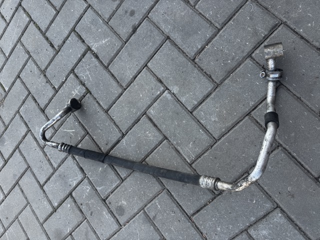 Шланг кондиціонера, від заднього випарювача до компресора 7H0820744AD VAG