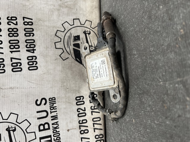 Датчик оксидів азоту NOX, задній A0009058411 MERCEDES