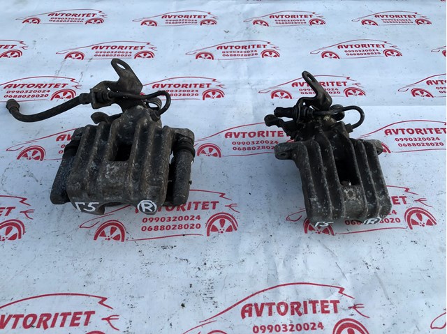 Супорт гальмівний задній правий 1K0615424J VAG