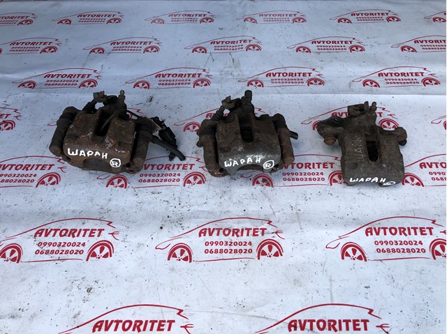 Задній гальмівний супорт лівий 7M0615423 VAG