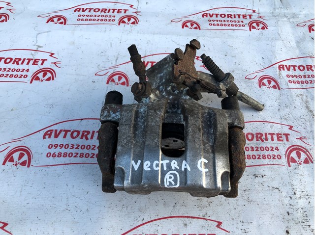 Супорт гальмівний задній правий 93172183 OPEL