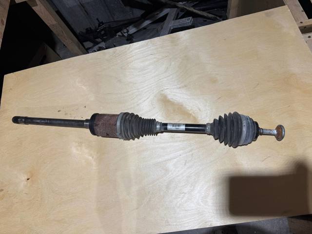 Привід передній правий 31607597694 BMW