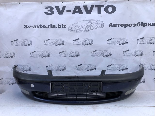 Бампер передній в зборі 90464527 OPEL