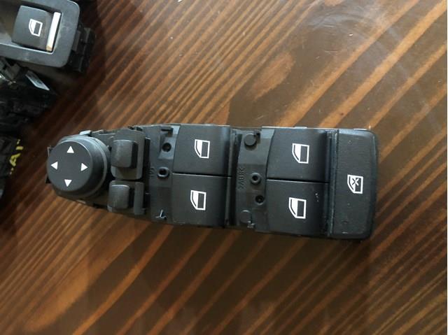 Кнопки переднього лівого склопід'ємника 9208111 BMW