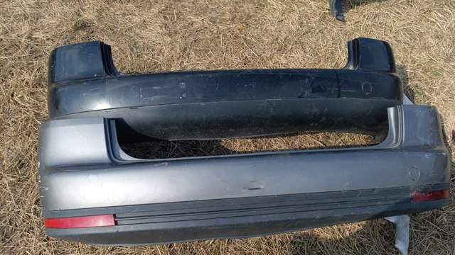 Бампер задній 1T0807417 VAG