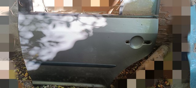 Двері пасажирськи задні ліві 1T0833055R VAG