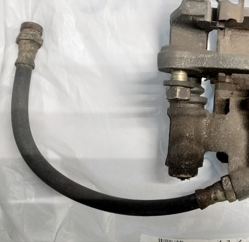 Гнучка гальмівна трубка задня MR129750 MITSUBISHI