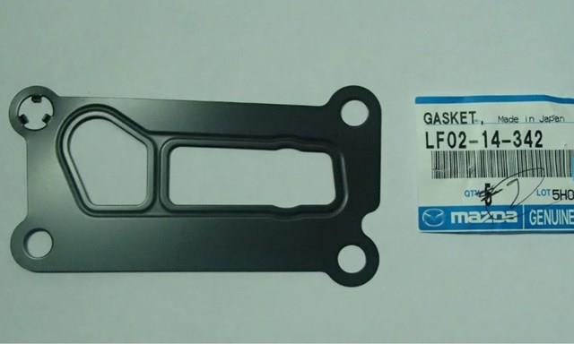 Прокладка адаптера маслянного фільтра LF0214342 MAZDA
