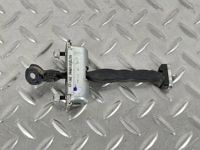 Обмежувач відкриття дверей, задній DS73F27200AE FORD