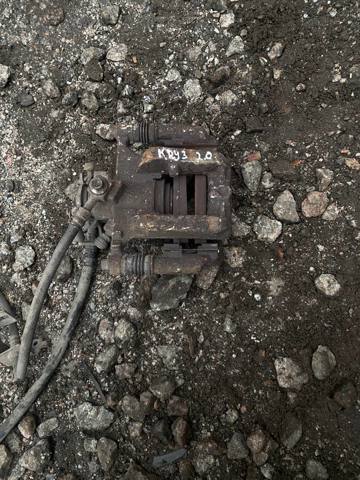 Задній гальмівний супорт лівий 13300861 GM