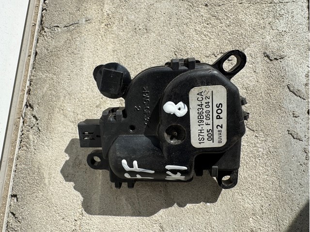 Мотор заслінки печі 1S7H19B634CA FORD