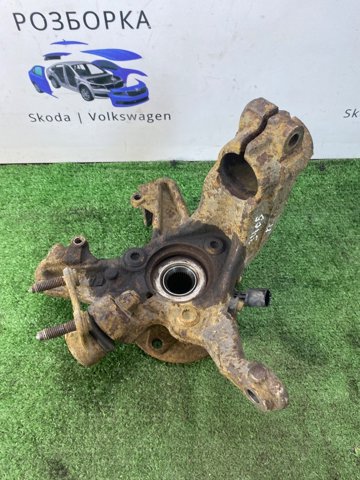 Кулак поворотний передній лівий 1K0407255T VAG