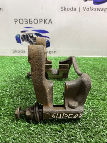 Скоба гальмівного заднього супорта 1K0615425M VAG