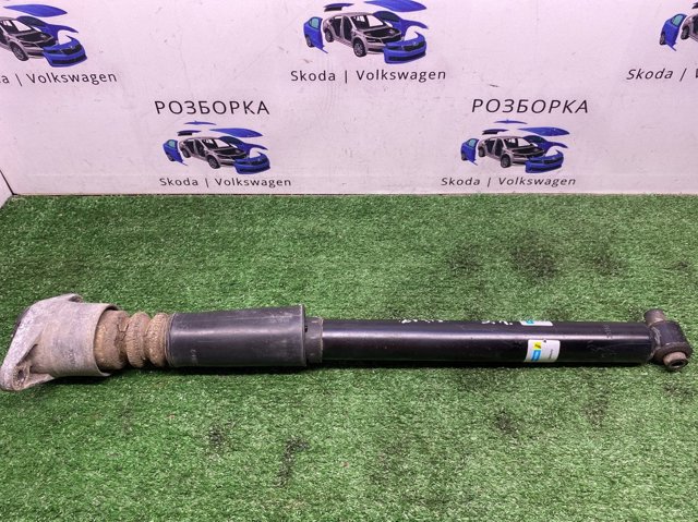 Стійка амортизатора задня 3B9513031G VAG