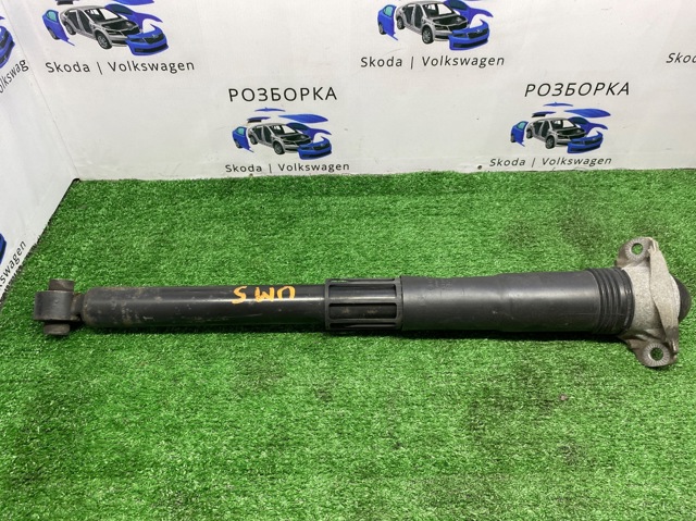Стійка амортизатора задня 5QN513049AQ VAG