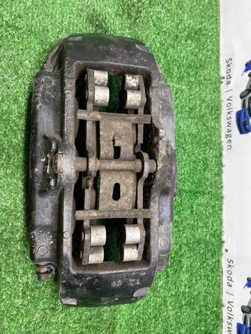Супорт гальмівний, передній, лівий 7L6615149 VAG