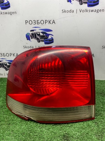 Задній лівий зовнішній ліхтар 7L6945095K VAG