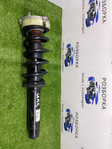 Стойка амортизатора передняя 80A413031AK VAG