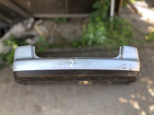 Бампер задній 1T0807421 VAG