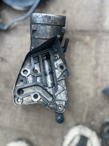 Корпус масляного фільтра 55565958 OPEL